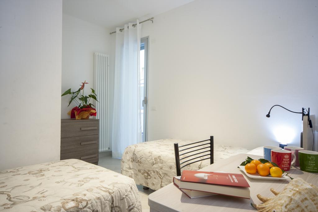 Appartamenti Residence Giardini ริชโชเน ภายนอก รูปภาพ