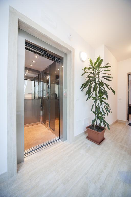 Appartamenti Residence Giardini ริชโชเน ภายนอก รูปภาพ