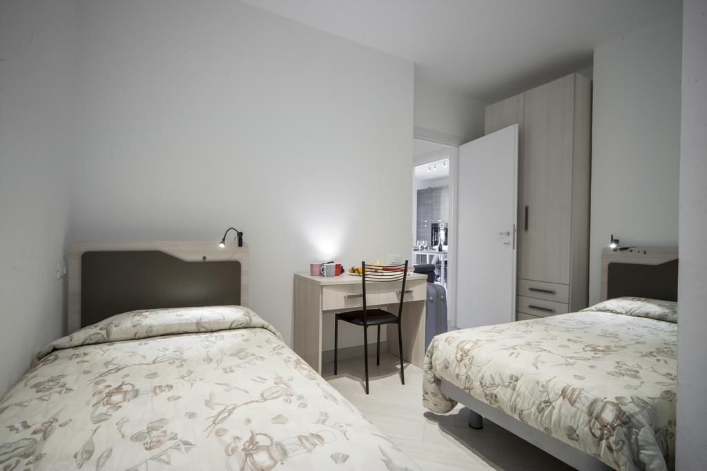 Appartamenti Residence Giardini ริชโชเน ภายนอก รูปภาพ