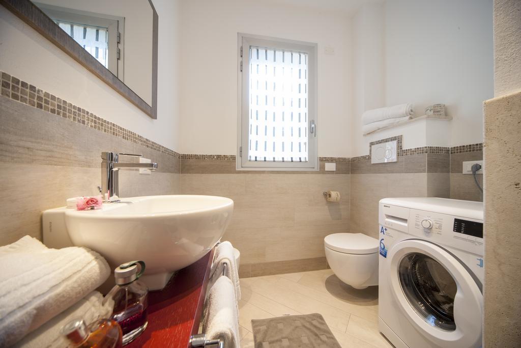 Appartamenti Residence Giardini ริชโชเน ภายนอก รูปภาพ